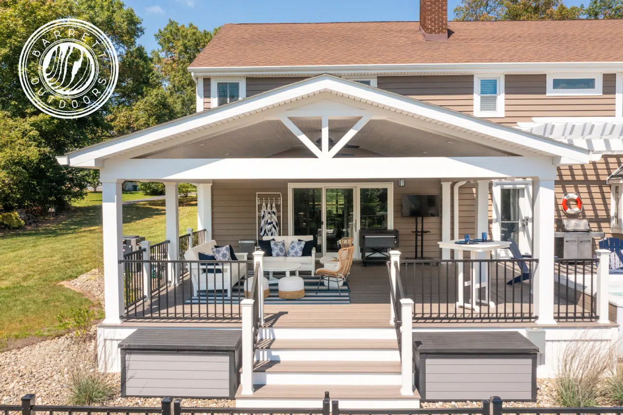 Covered deck ideas: Photo of covered deck with stairs and railing - Custom Covered Deck builder and contractor in New Jersey