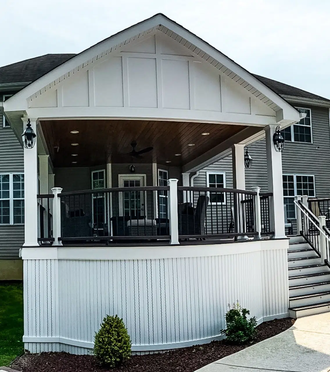 Covered Porch Ideas - Photo of raised covered deck with skirting - Covered Deck Builders in New Jersey