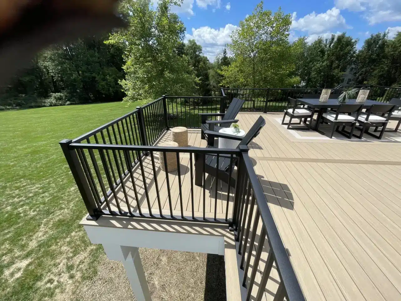 Custom Elevated Composite Timbertech Deck with black aluminum railings built in New Jersey