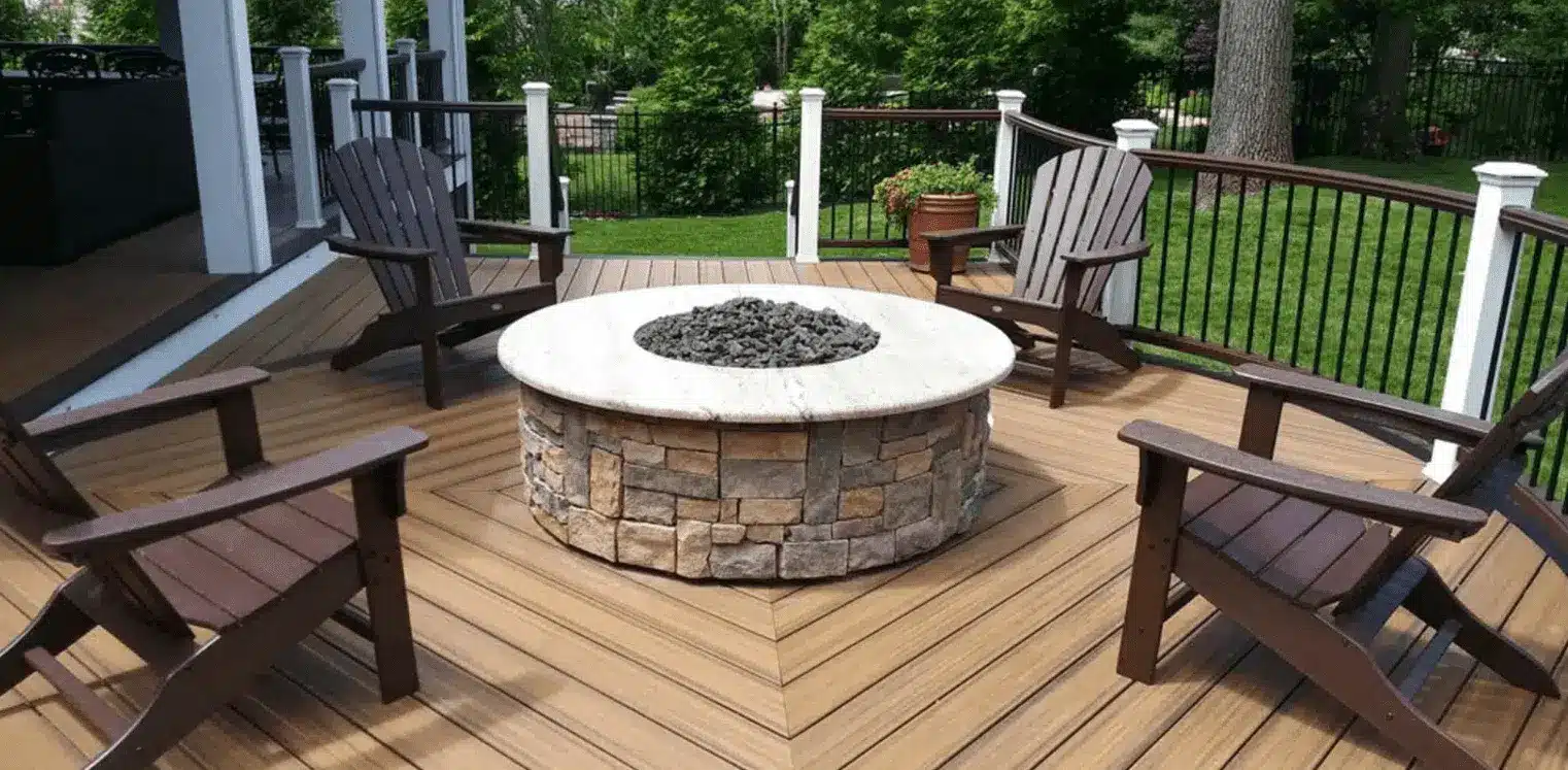 photo of a custom deck with outdoor living features like a fire pit and deck railing - outdoor living features - Custom Fire features - fire pits - fireplaces Builder near me