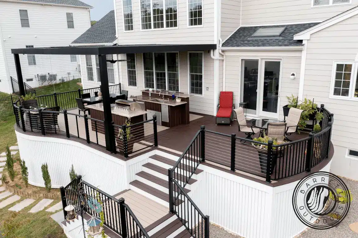 photo of a raised deck with an outdoor kitchen - outdoor living features - Custom Outdoor Kitchens Builder near me