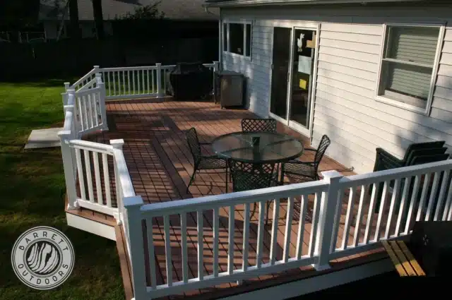 photo of a single-level deck with deck railing